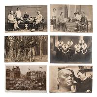 [EARLY PHOTOGRAPHY]. A group of 56 real photo postcards of performers and curious scenes and subjects from the United States and abroad, including: