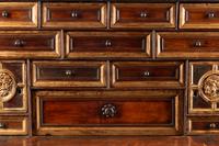 A Spanish Baroque Parcel Gilt Walnut Vargueño on Stand