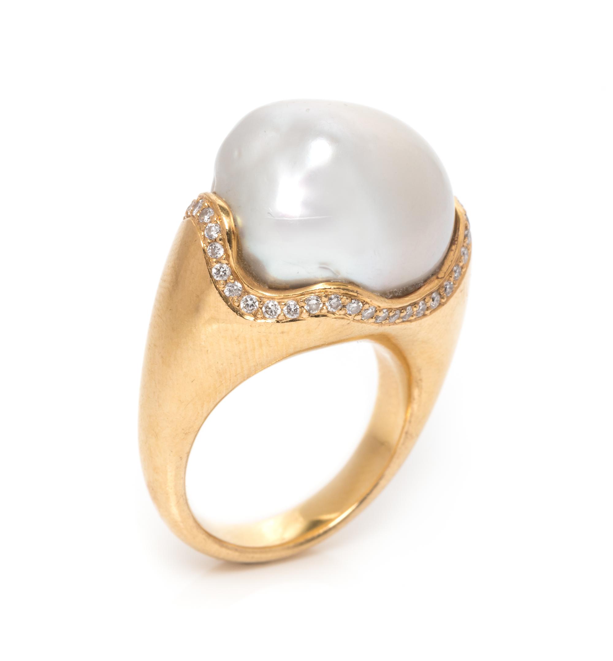 An 18 Karat Yellow Gold, Baroque Cultured Pearl and Diamond Ring, 9.85 dwts.