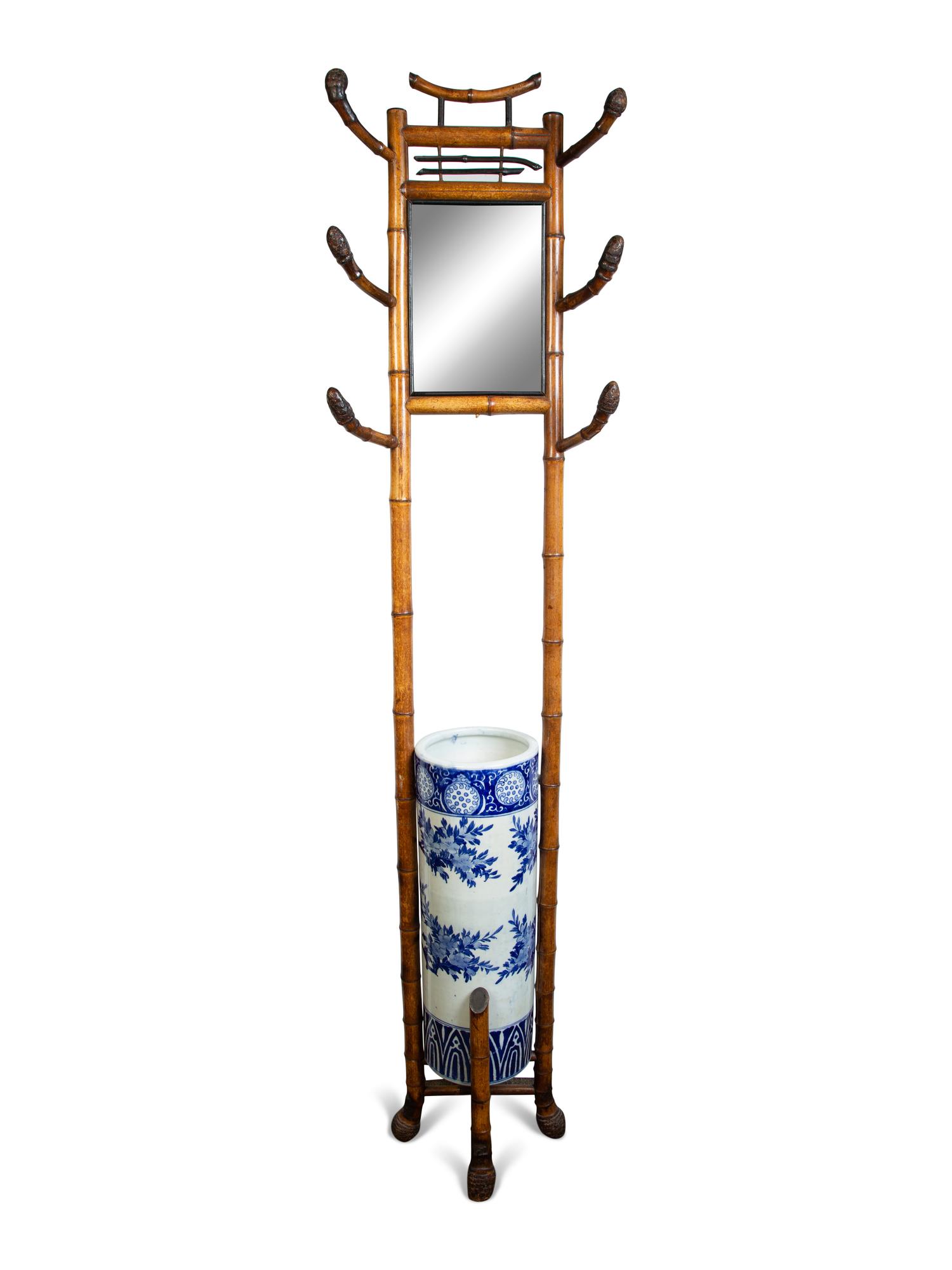 A Chinese Bamboo Hall Stand Fitted with a Blue and White Porcelain Umbrella Jar — 19TH/20TH CENTURY