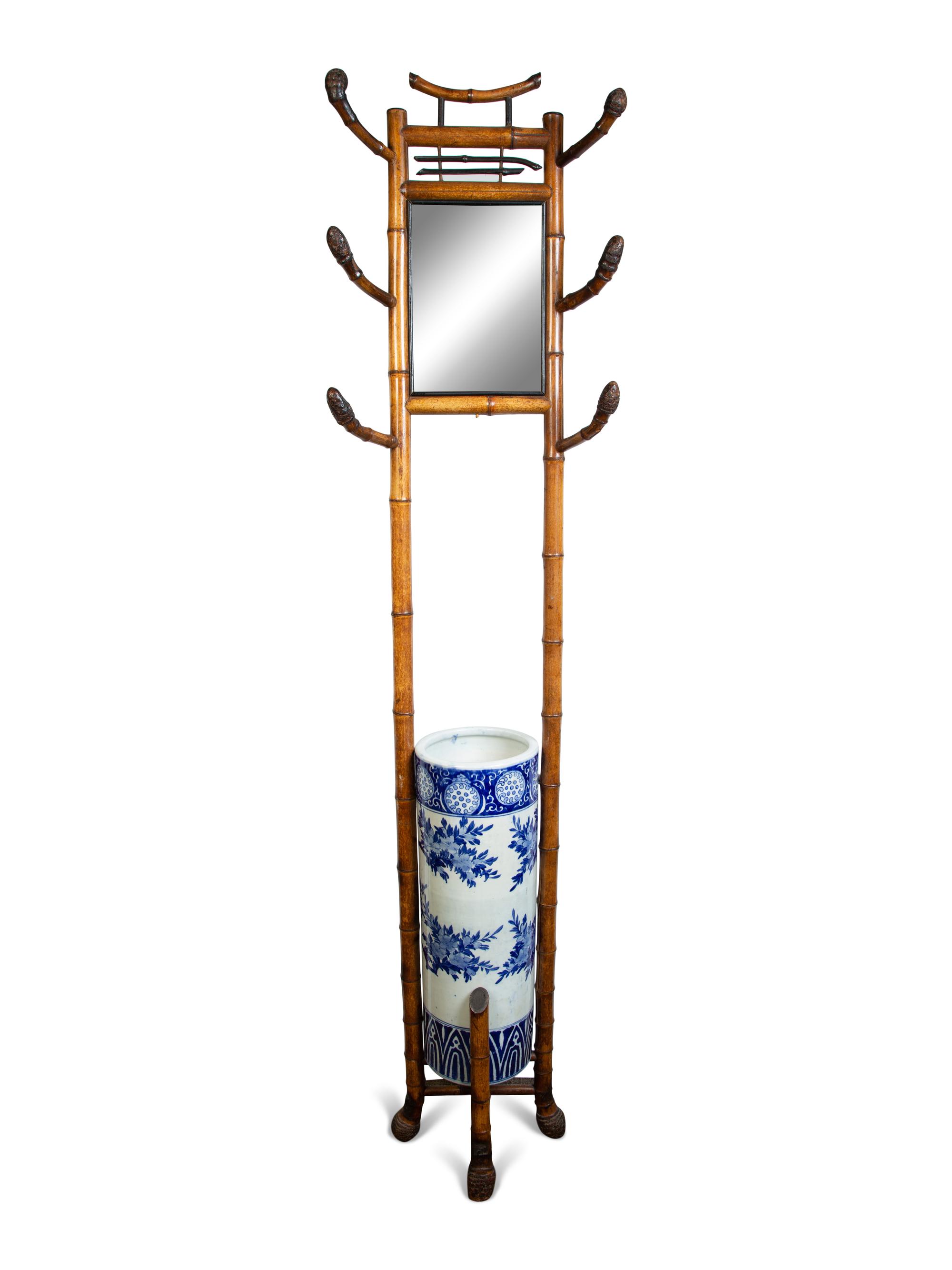 A Chinese Bamboo Hall Stand Fitted with a Blue and White Porcelain Umbrella Jar — 19TH/20TH CENTURY