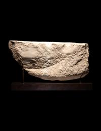 An Egyptian Limestone Relief with an Inscription