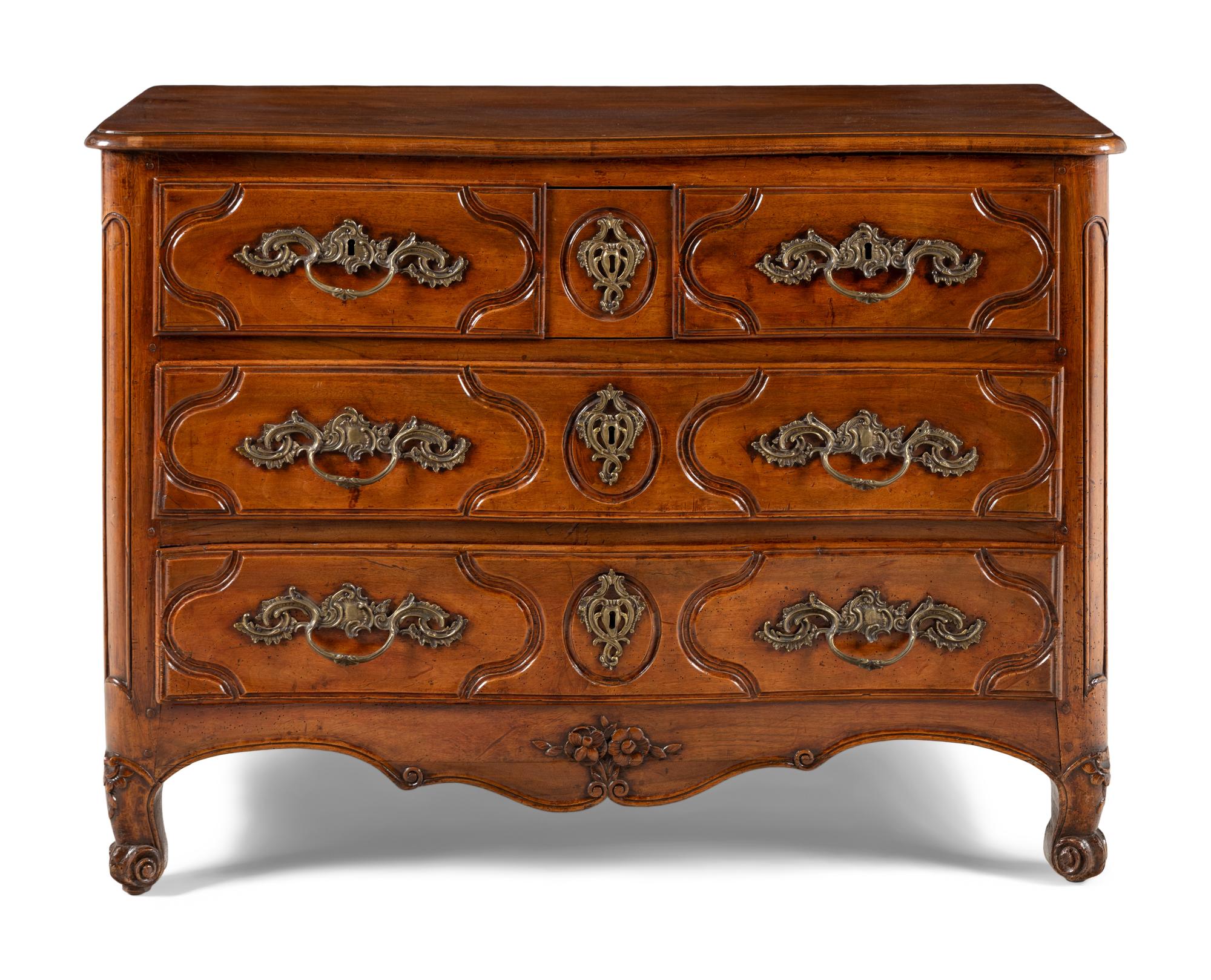 A Louis XV Provincial Walnut Commode