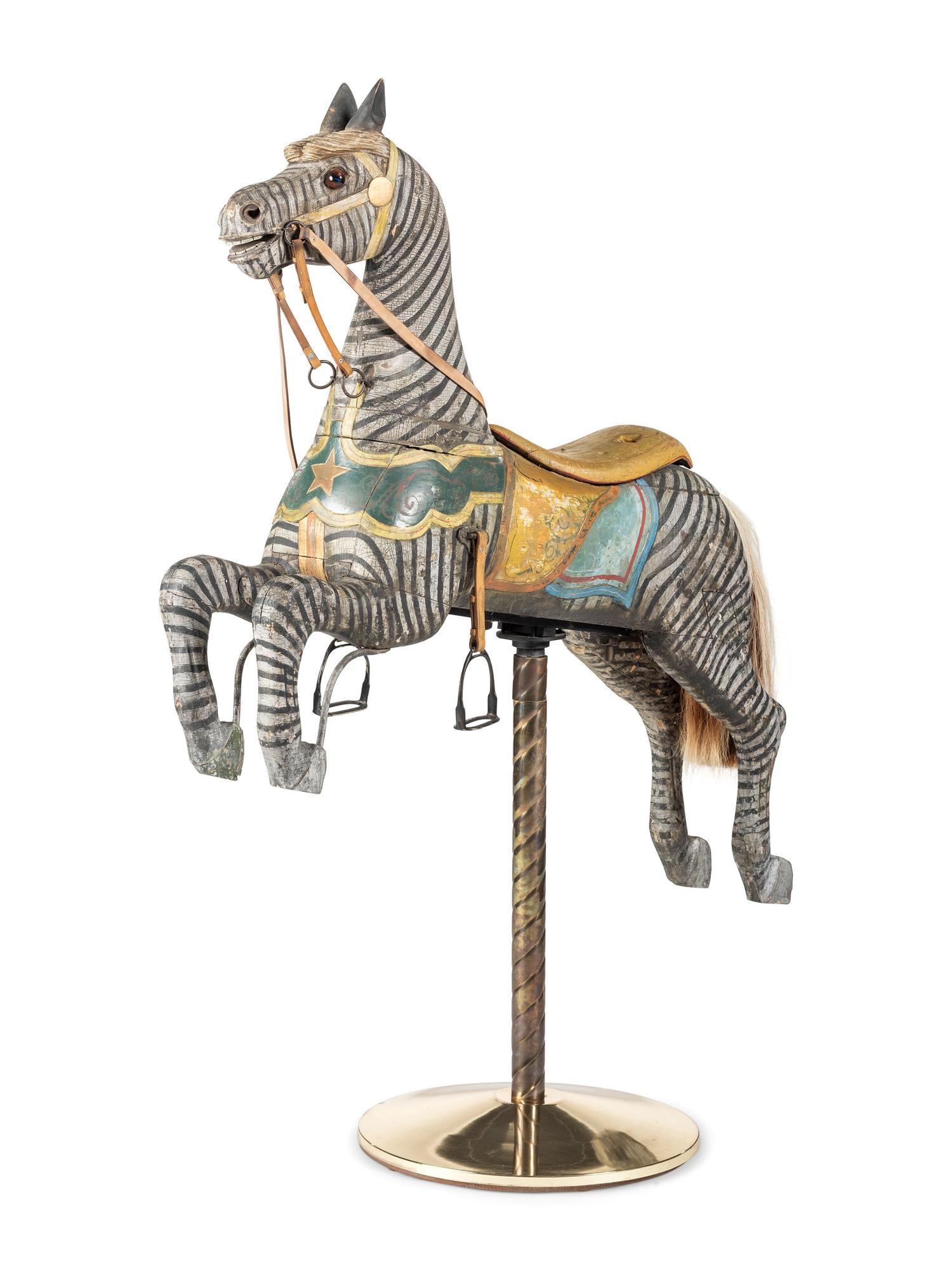 A Glass Inset Carved, Parcel-Gilt and Painted Wood Zebra Carousel Figure