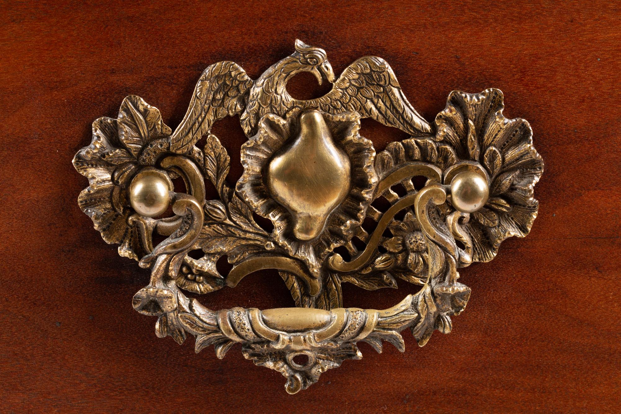 A Portuguese Carved Walnut Commode