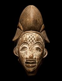 Four Punu Wood Masks