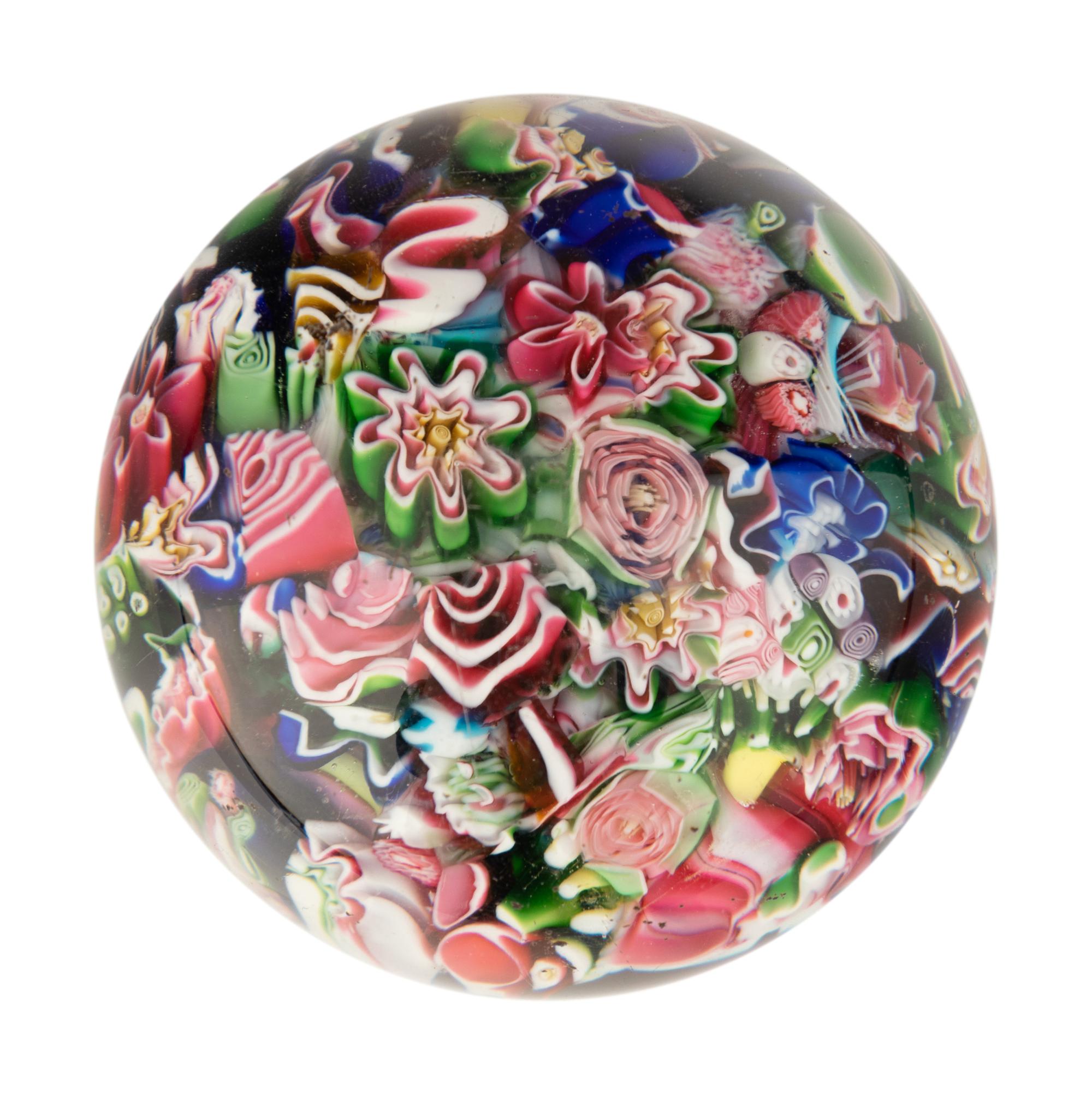 A Clichy End-of-Day Scrambled Millefiori Glass Paperweight