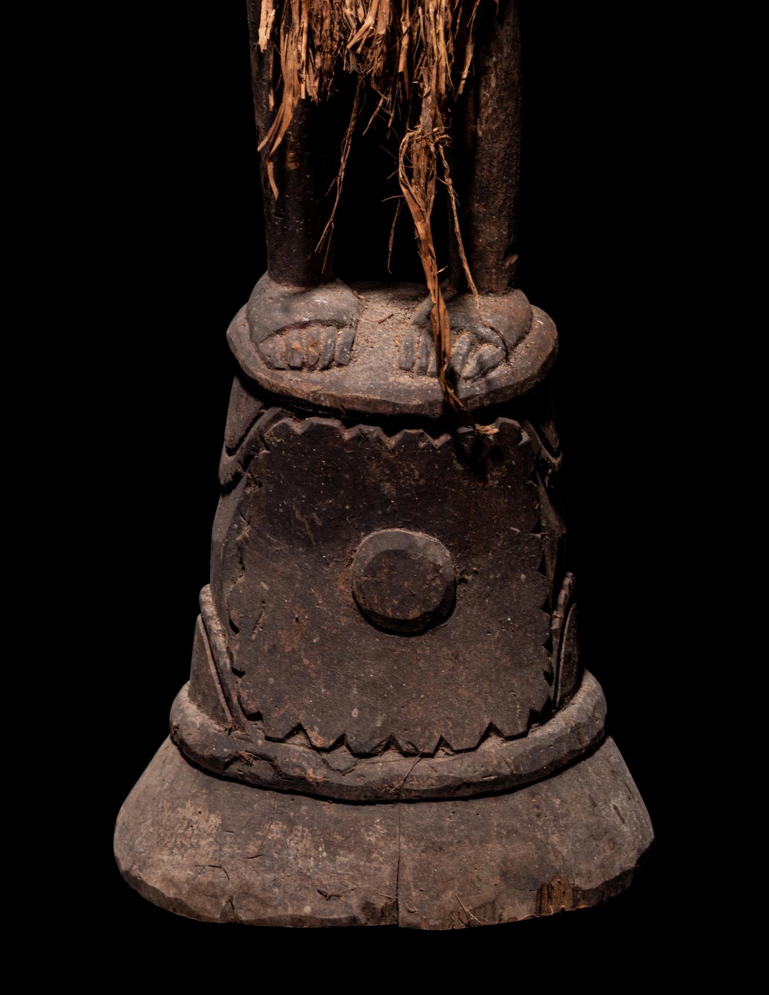A Kanganamon Wood Standing Figure
