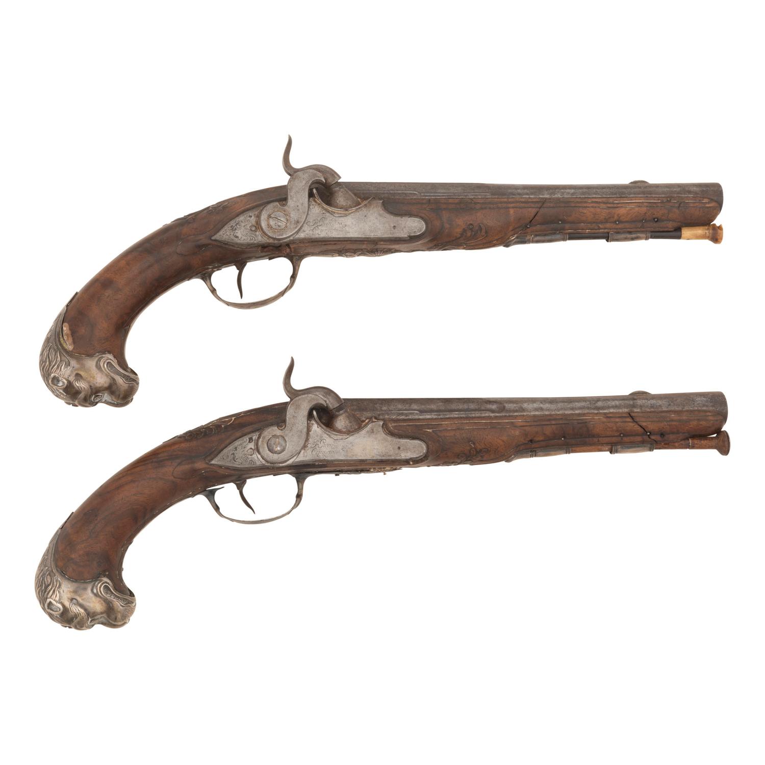 A Pair of Silver Mounted French Percussion Pistols
