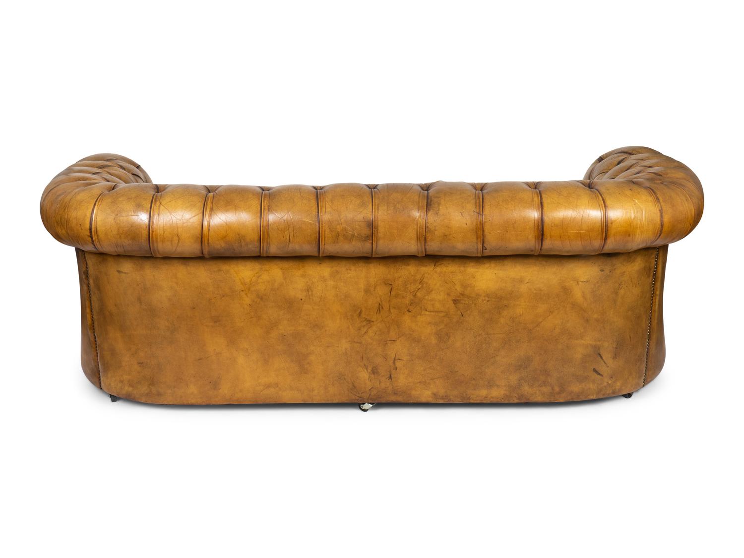 An English Edwardian Tufted Leather Chesterfield Sofa — 20TH CENTURY