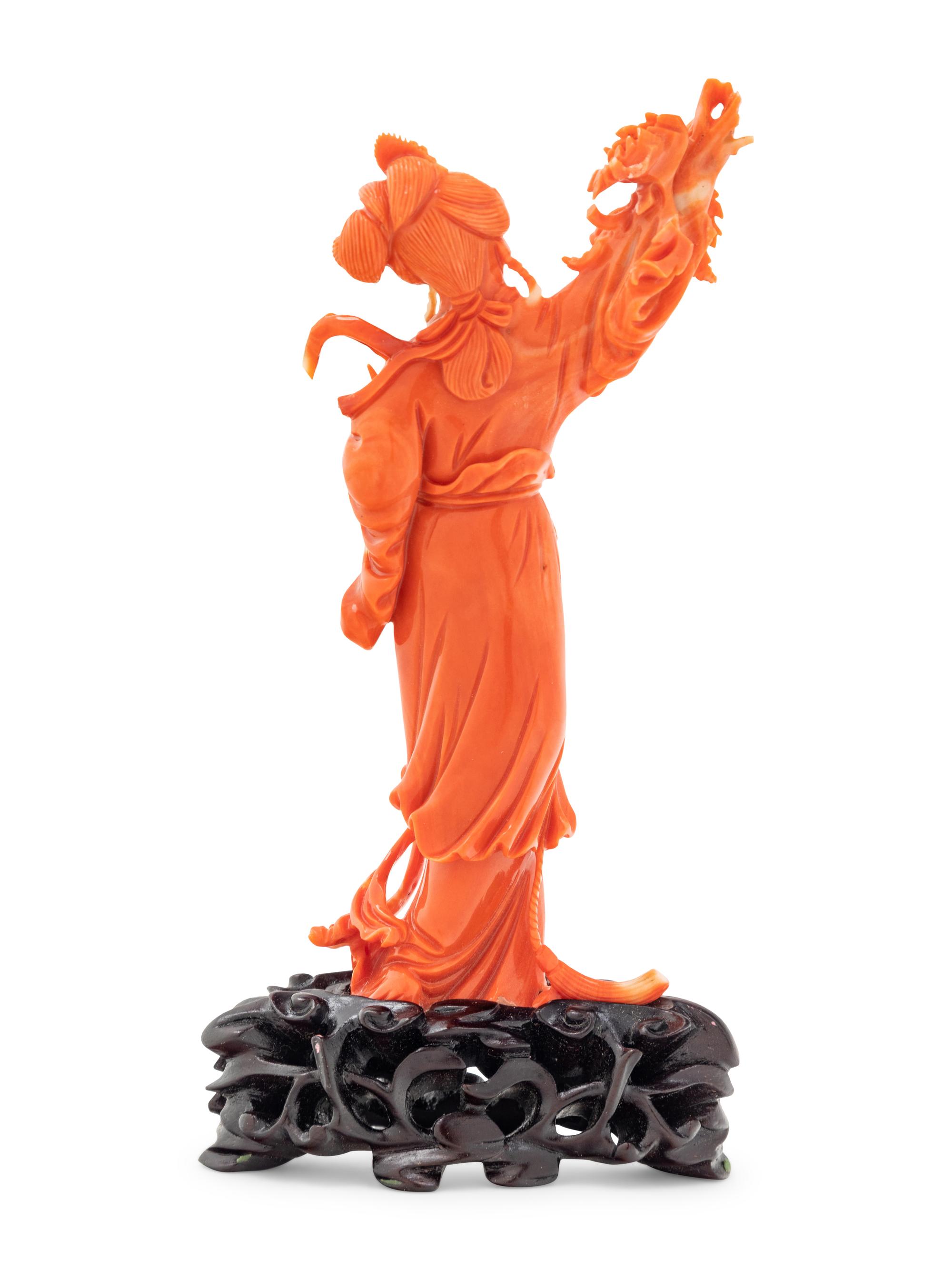 A Chinese Red Coral Figure of a Lady
