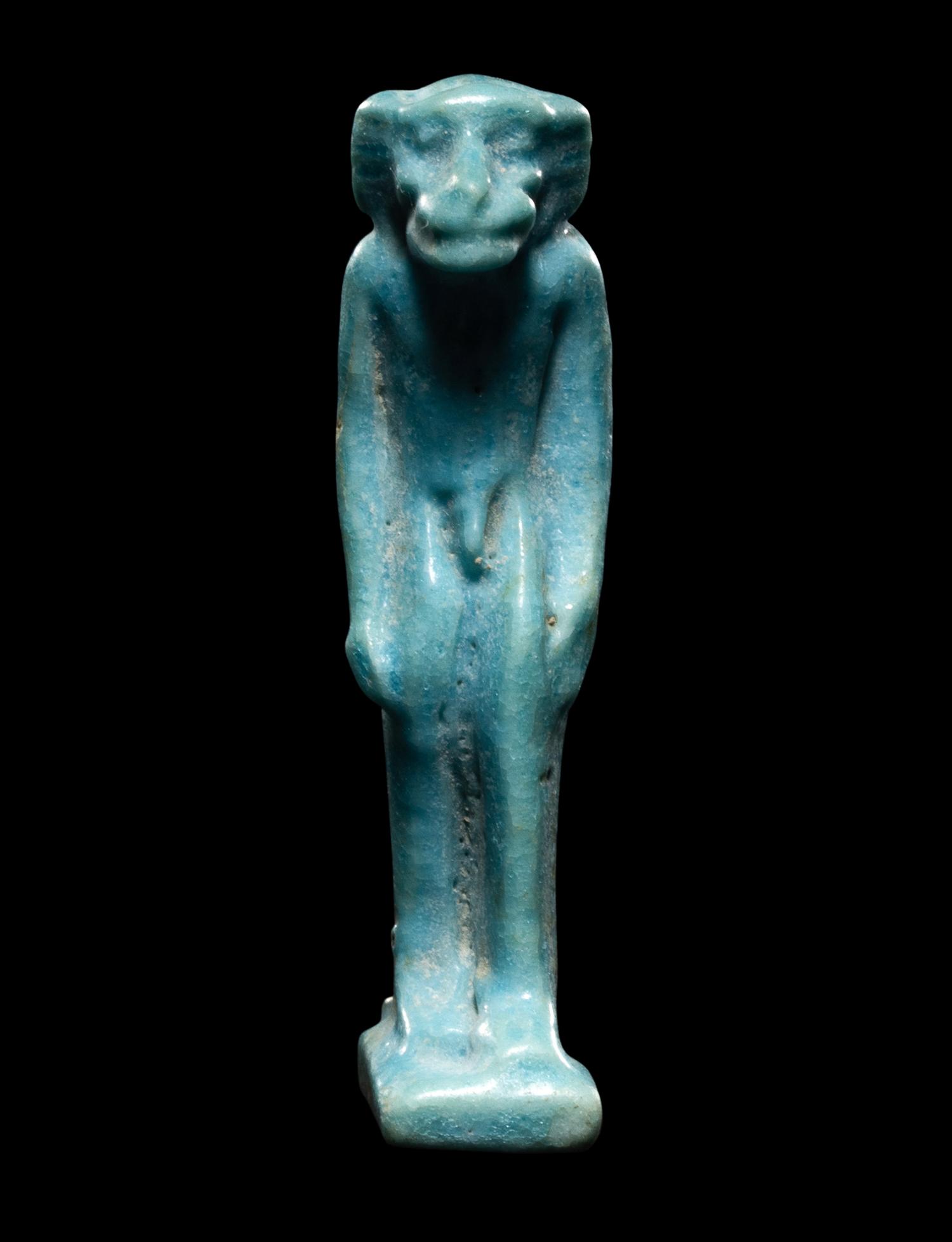 An Egyptian Faience Monkey