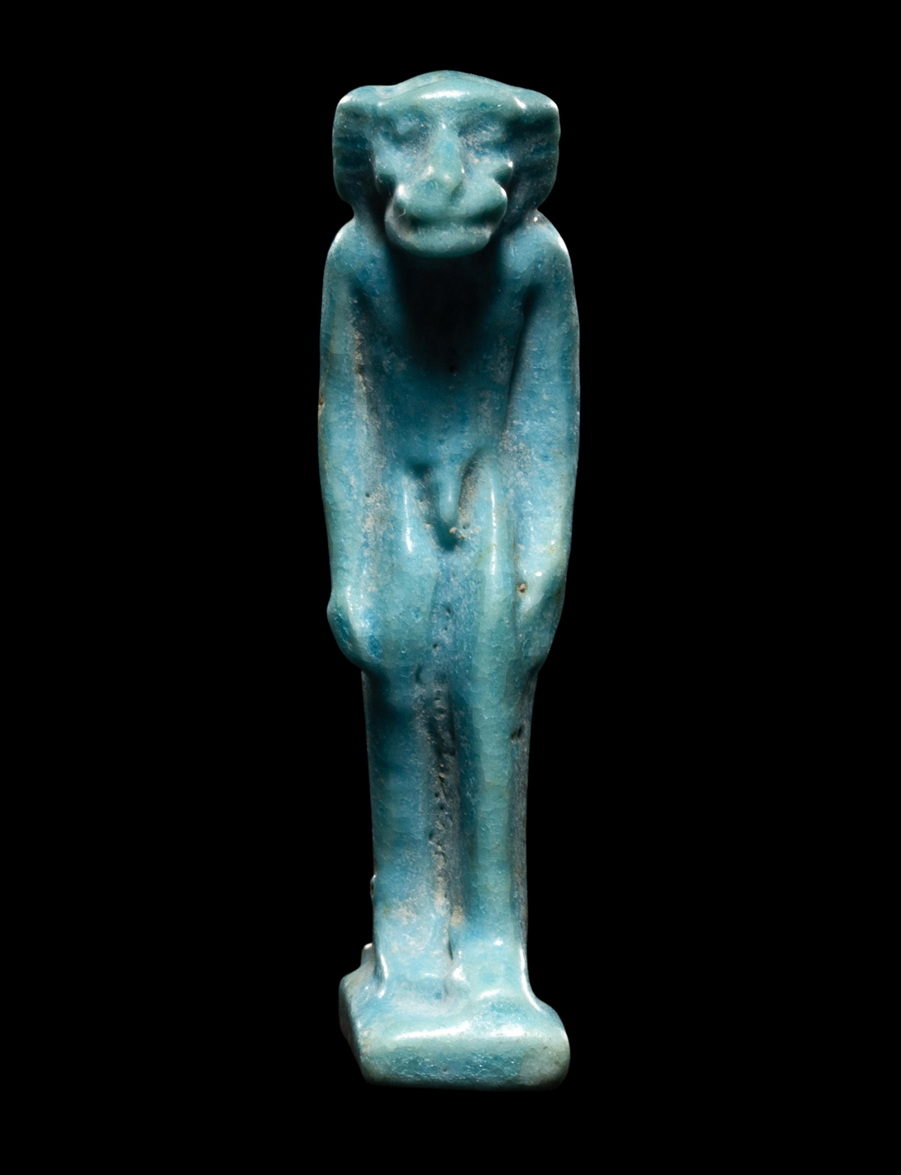 An Egyptian Faience Monkey