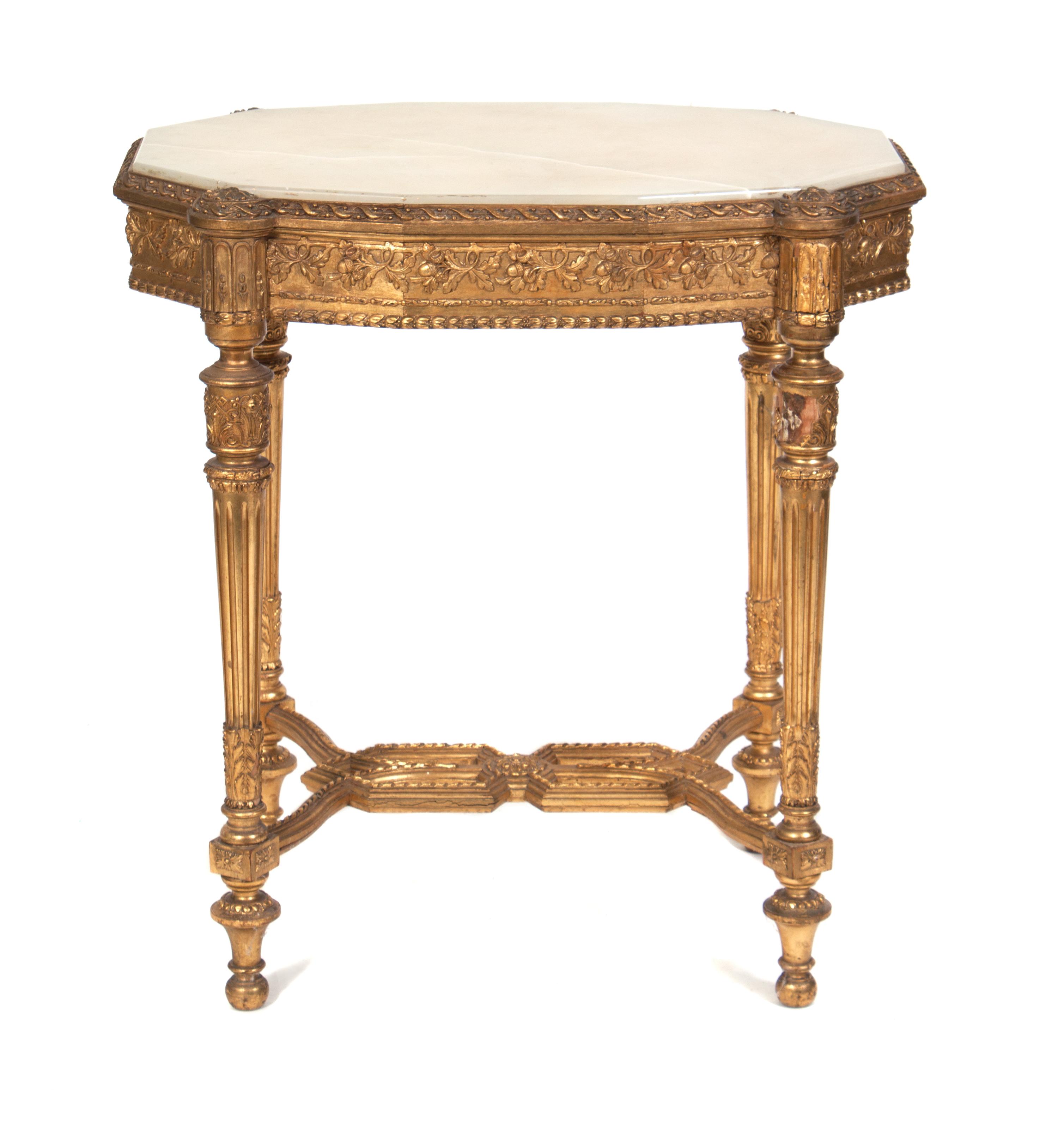 A Louis XVI Style Giltwood Occasional Table Height 29 1/2 x width 27 x depth 18 1/2 inches.