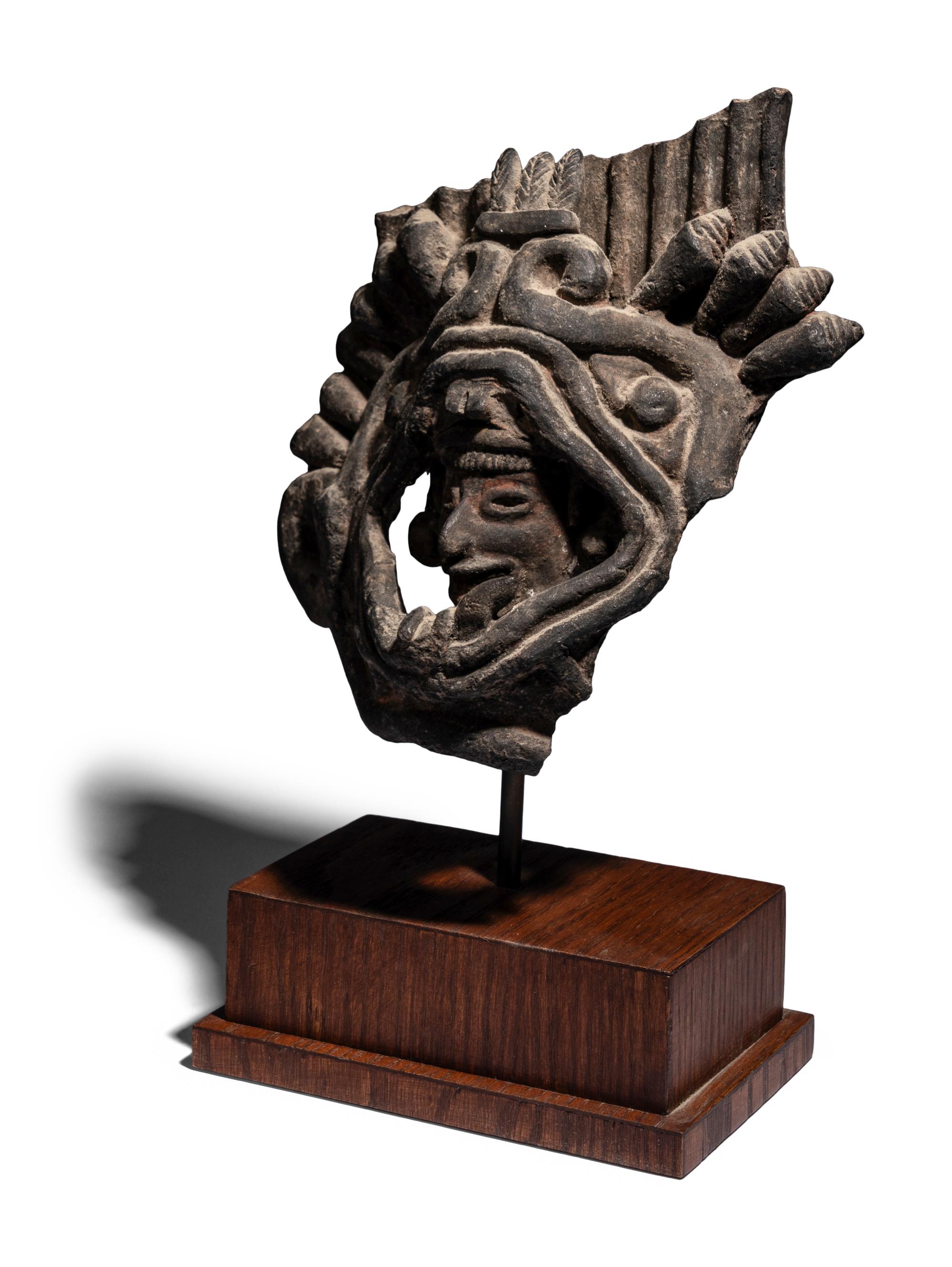 A Zapotec Terracotta Figure of a God