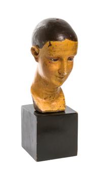 A Carved and Polychrome Decorated Bust, Height 8 1/8 inches.