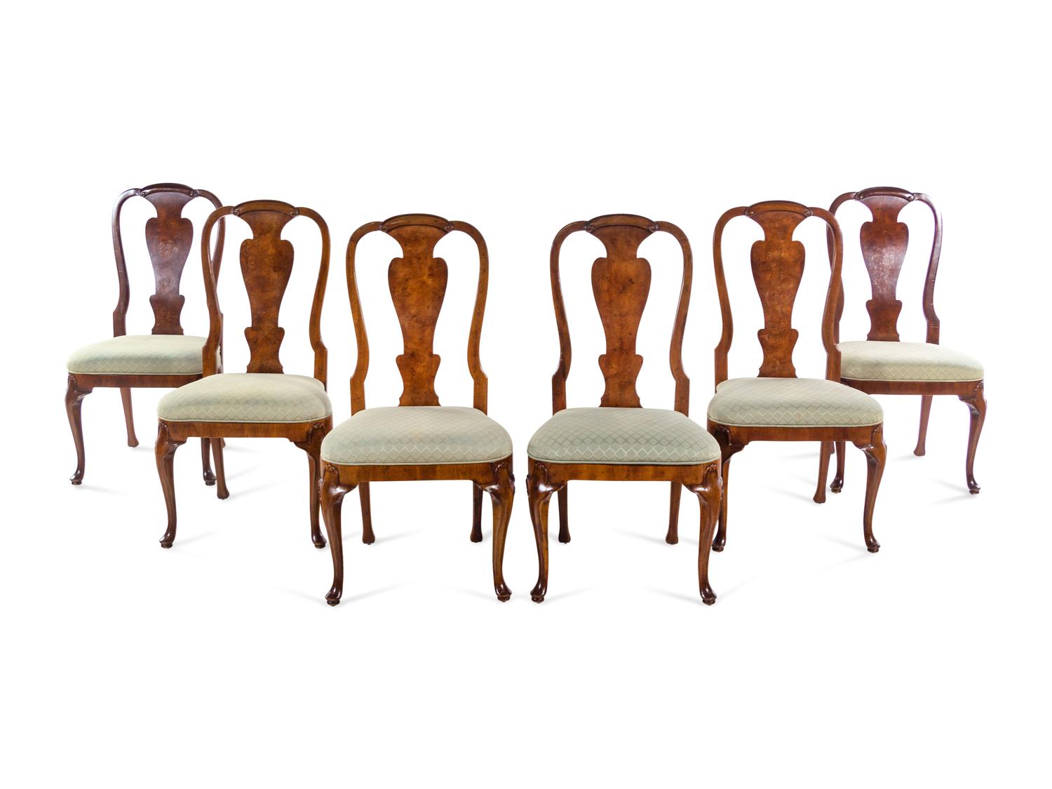 A Set of Six George I Style Walnut Dining Chairs
