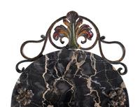 A Wrought Iron and Marble-Top Table