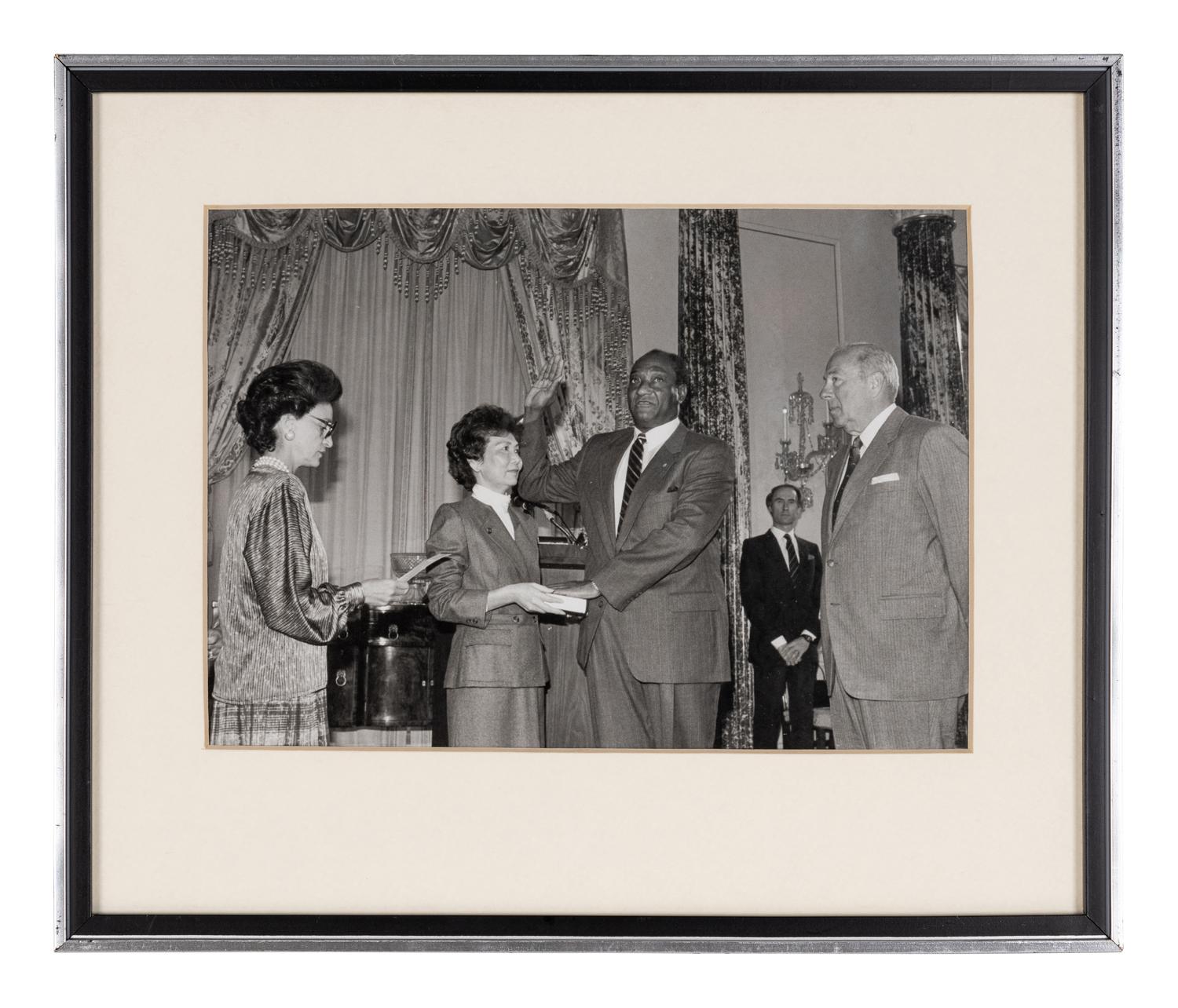 [PERKINS, Edward Joseph (1928-2020)]. A group of 10 photographs in 9 frames, from political figures to Perkins, many signed or inscribed (several presumably with secretarial or facsimile signatures), including: