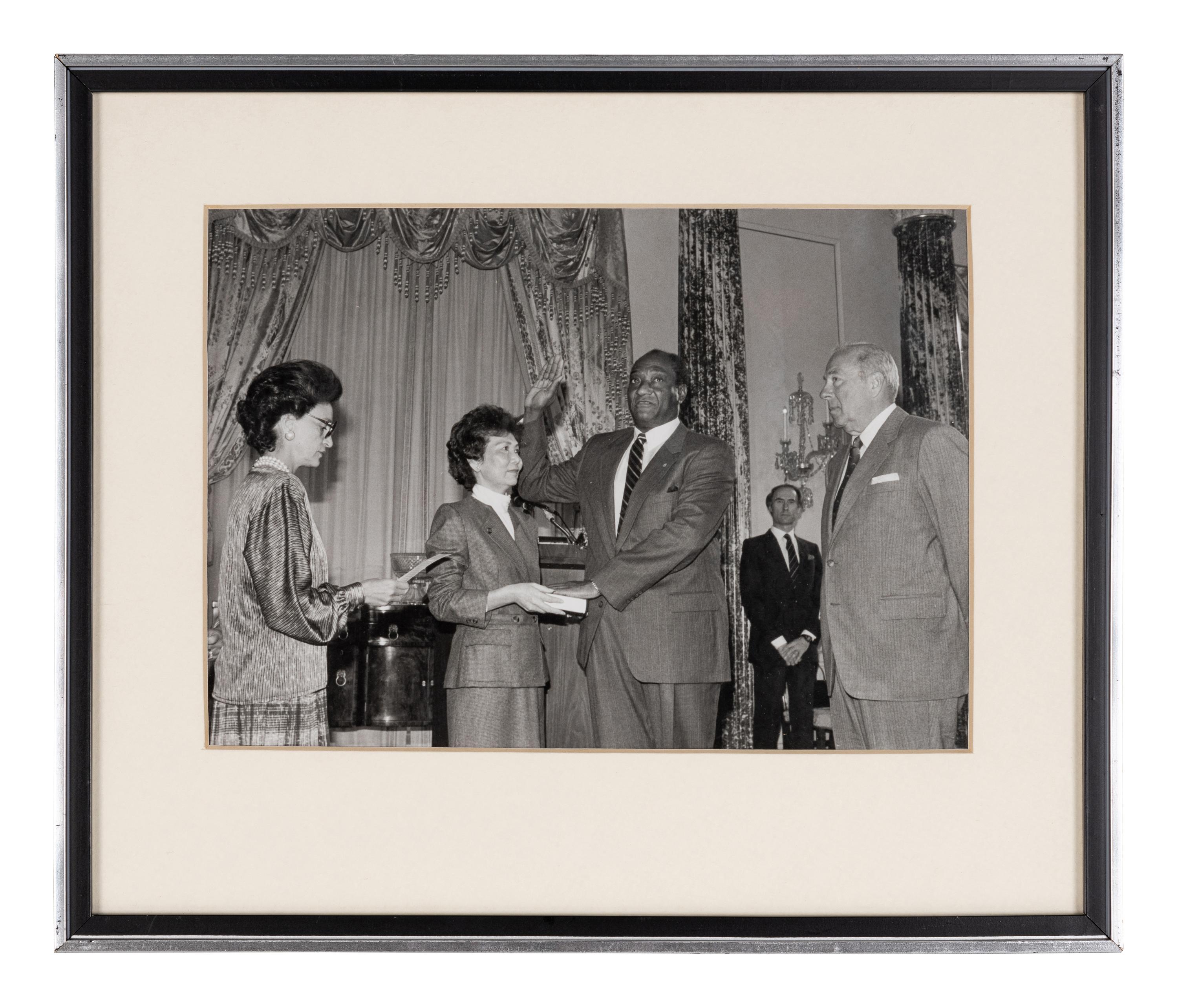 [PERKINS, Edward Joseph (1928-2020)]. A group of 10 photographs in 9 frames, from political figures to Perkins, many signed or inscribed (several presumably with secretarial or facsimile signatures), including: