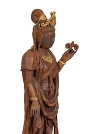 A Carved and Gilt Guanyin Statue