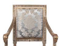 A Pair of Louis XVI Style Carved and Silver Paint Decorated Fauteuils