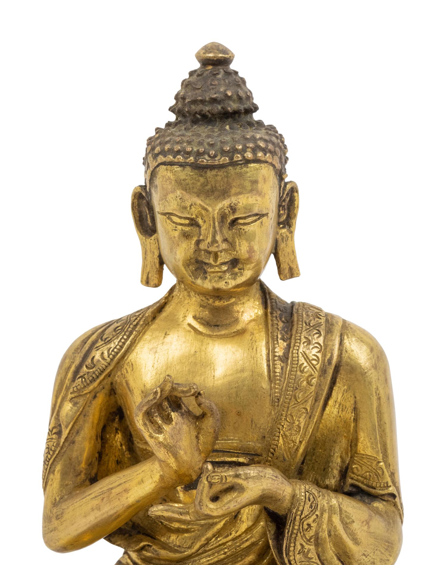 A Sino-Tibetan Gilt Bronze Seated Figure of Buddha Shakyamuni