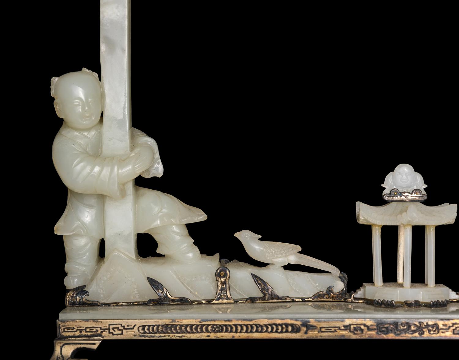 An Edward I. Farmer White Jade and Silver Mounted Chinoiserie Desk Clock, Circa 1930 Edward I. Farmer約1930年製中國風白玉童子座鐘