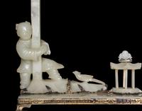 An Edward I. Farmer White Jade and Silver Mounted Chinoiserie Desk Clock, Circa 1930 Edward I. Farmer約1930年製中國風白玉童子座鐘
