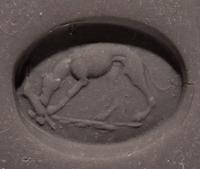 A Roman Red Jasper Ring Stone with a Coursing Hound and Hare
