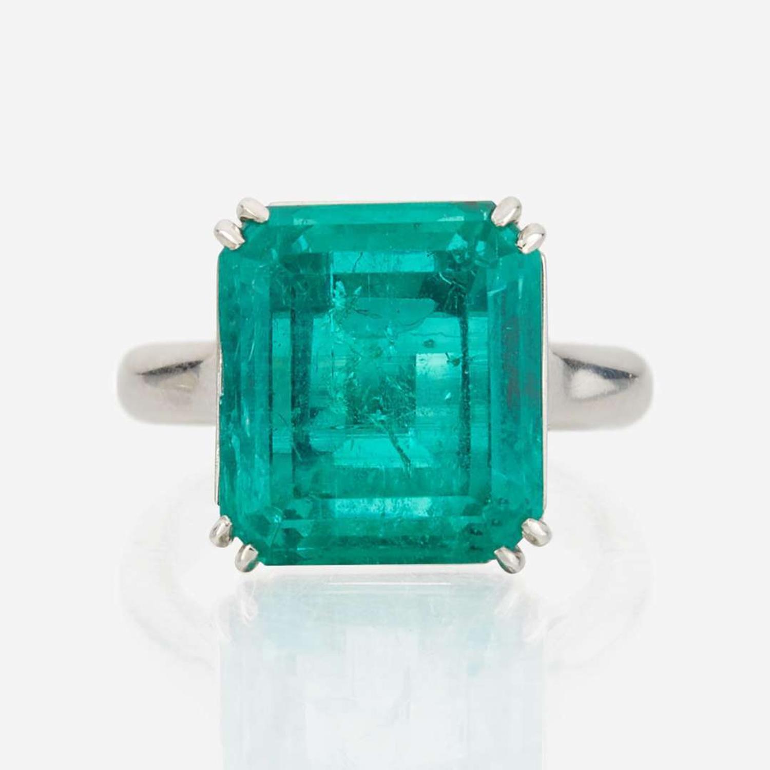 An emerald and platinum ring, Cartier