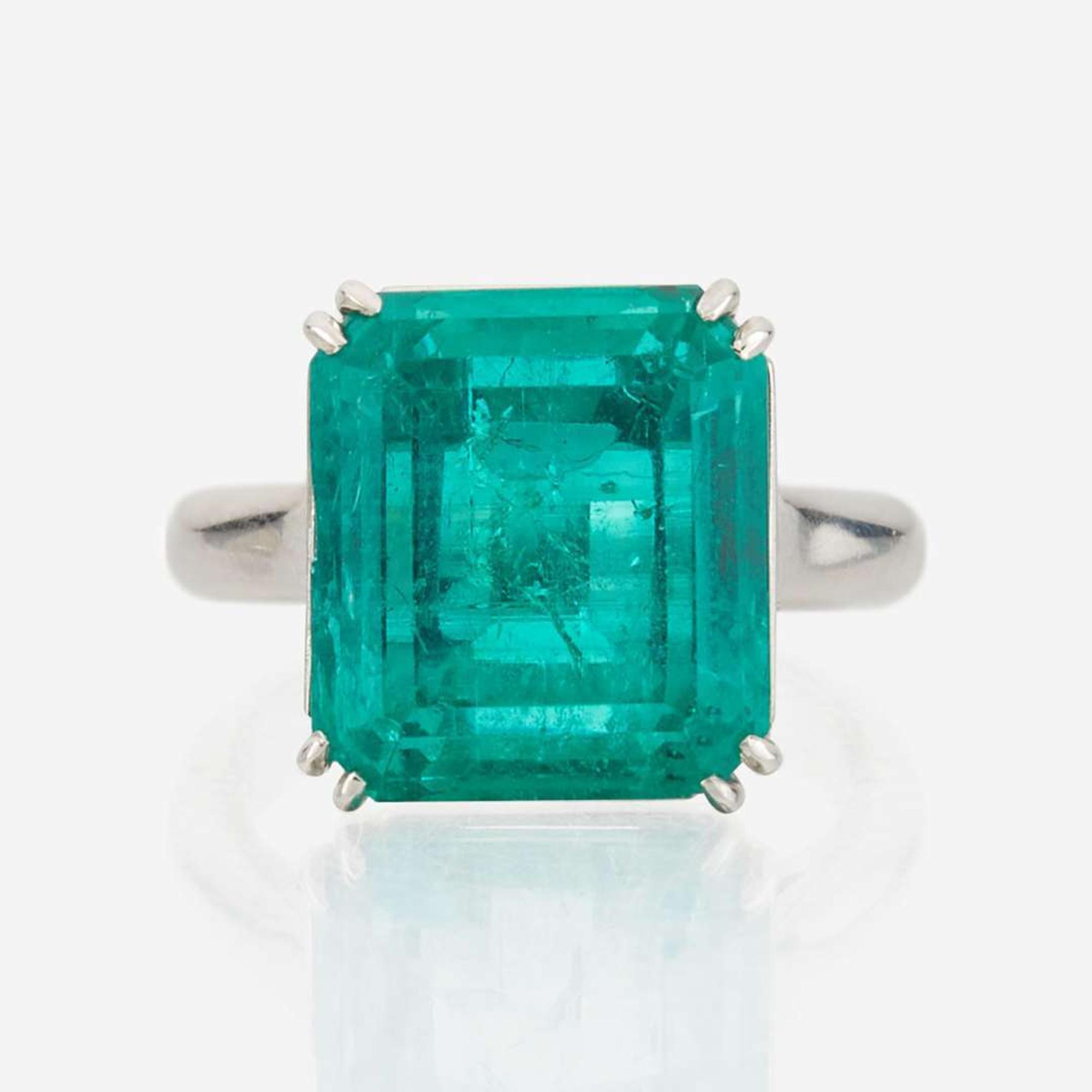 An emerald and platinum ring, Cartier