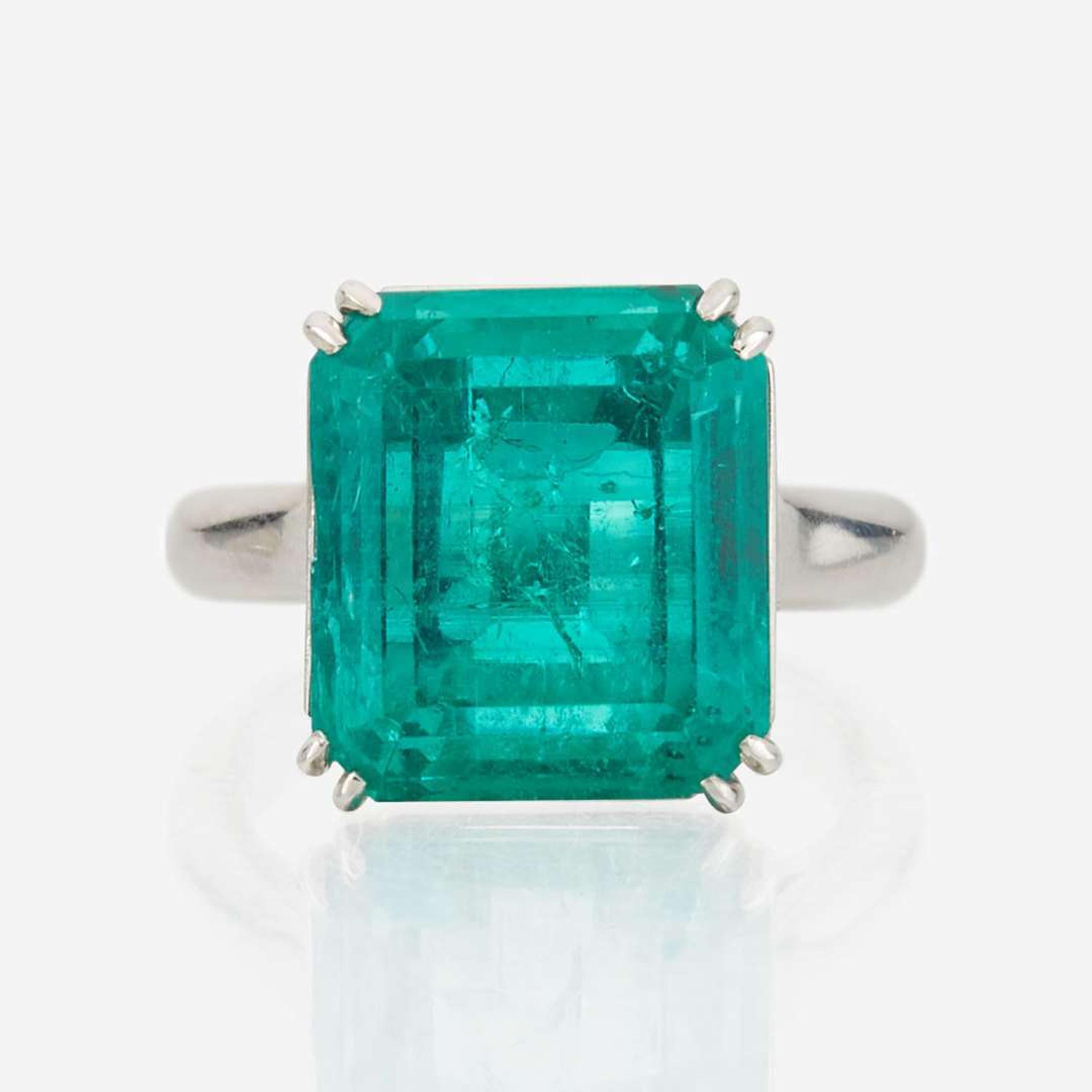 An emerald and platinum ring, Cartier