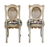 A Pair of Louis XVI Style Painted and Parcel-Gilt Chaises