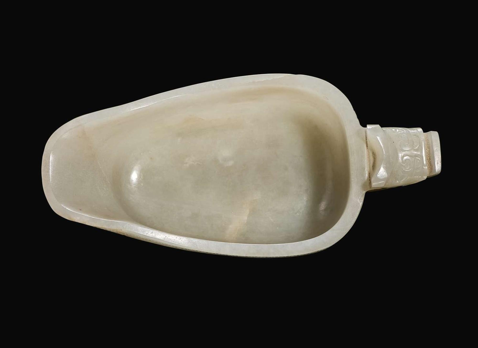 A Chinese carved white jade "Yi" water coupe, 18th/early 19th century or earlier 白玉水匜 十八至十九世紀或更早