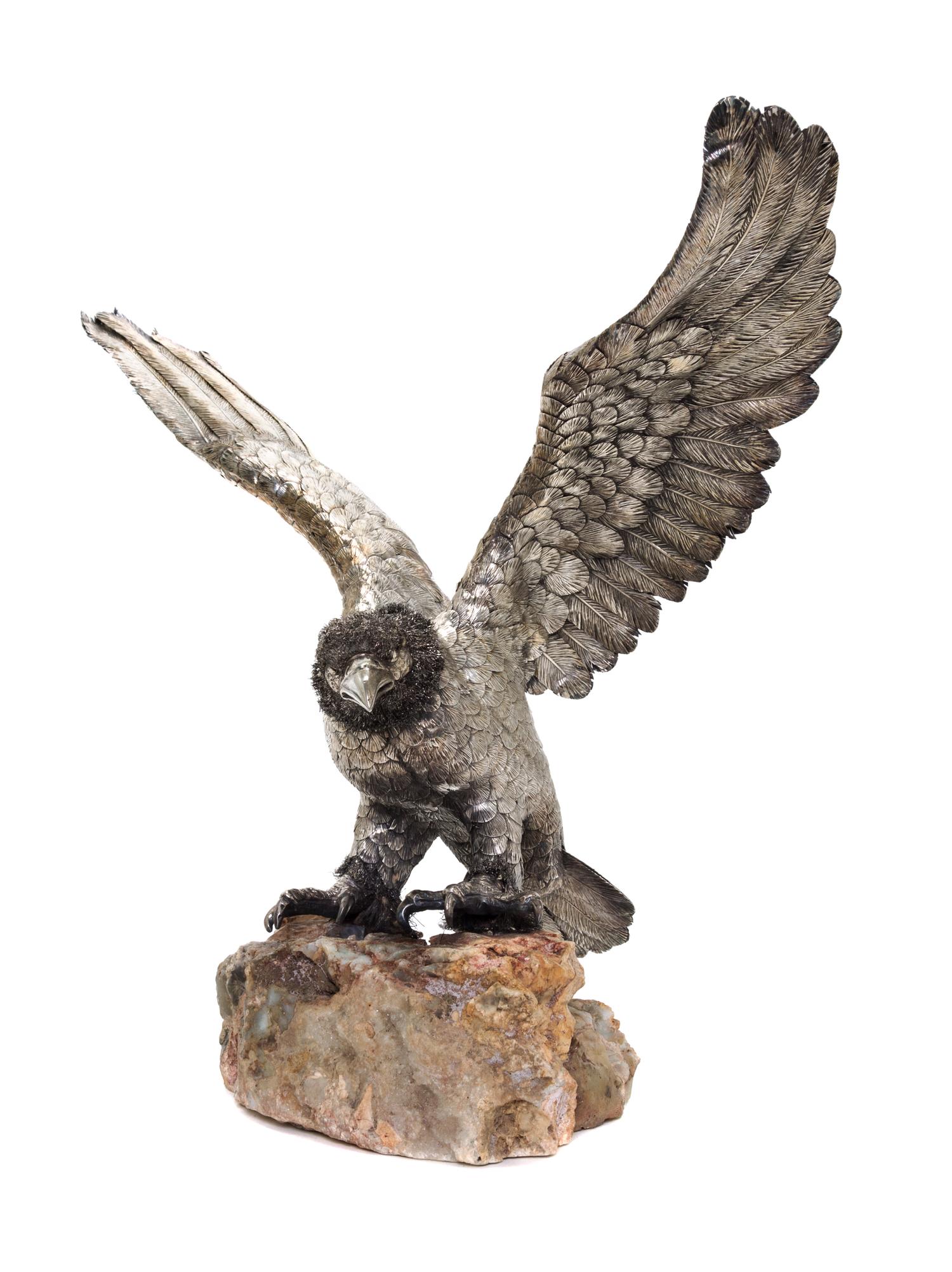 An Italian Silver Model of an Eagle, Manner of Buccellati, Florence, 20th Century, with outstretched wings, on a rock base.