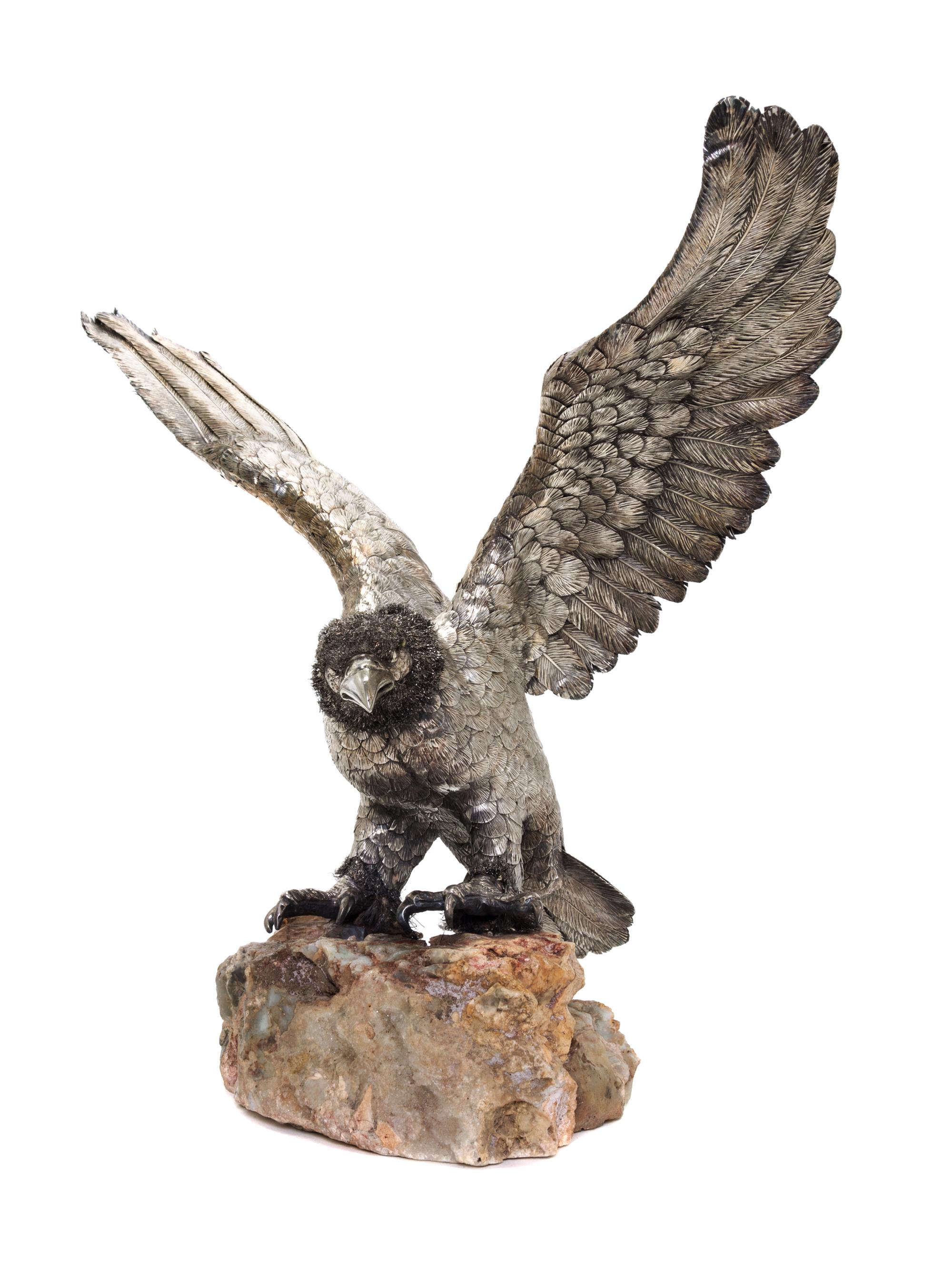 An Italian Silver Model of an Eagle, Manner of Buccellati, Florence, 20th Century, with outstretched wings, on a rock base.