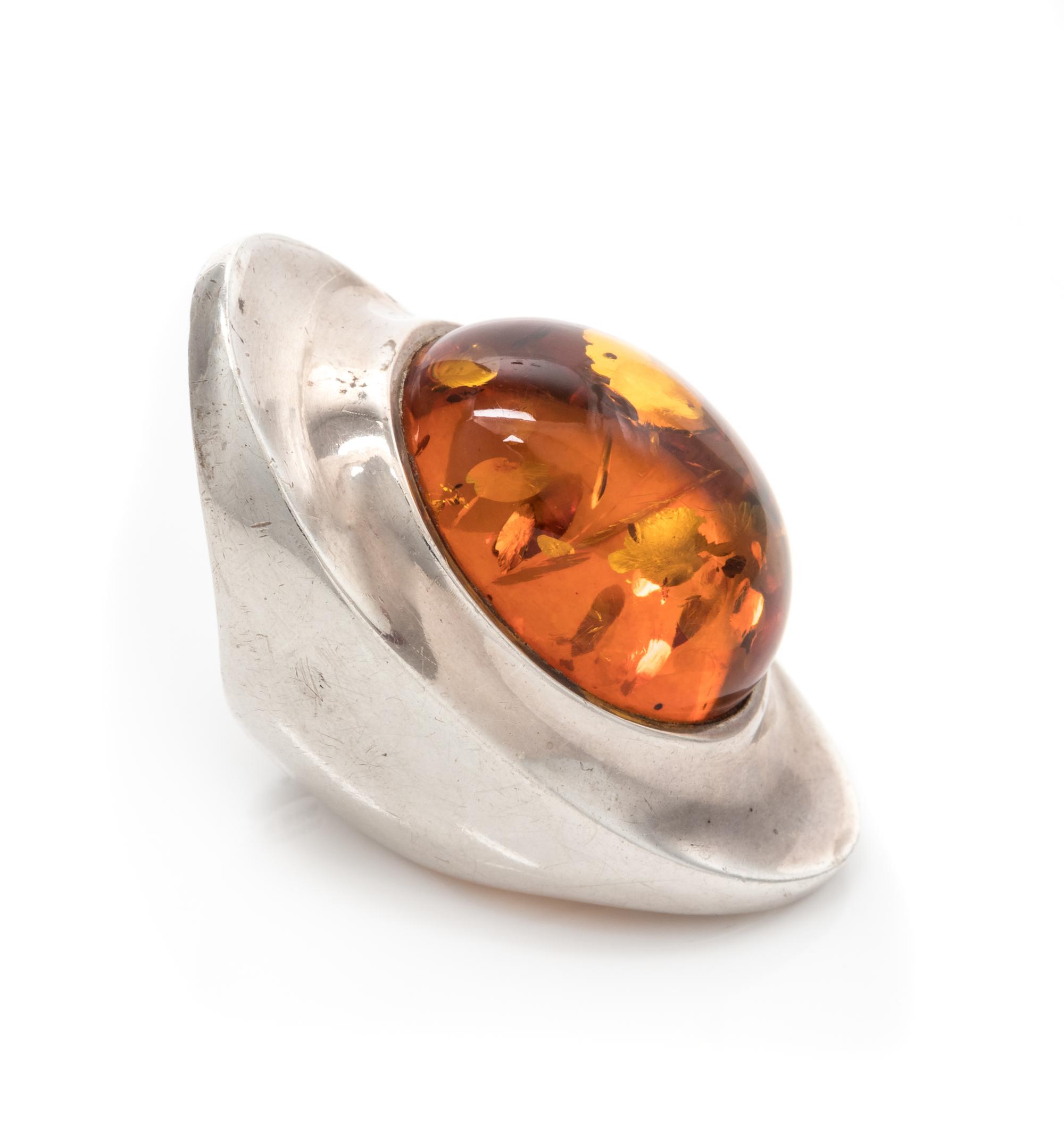 A Modernist Sterling Silver and Amber Ring, Henning Koppel for Georg Jensen, 17.40 dwts.