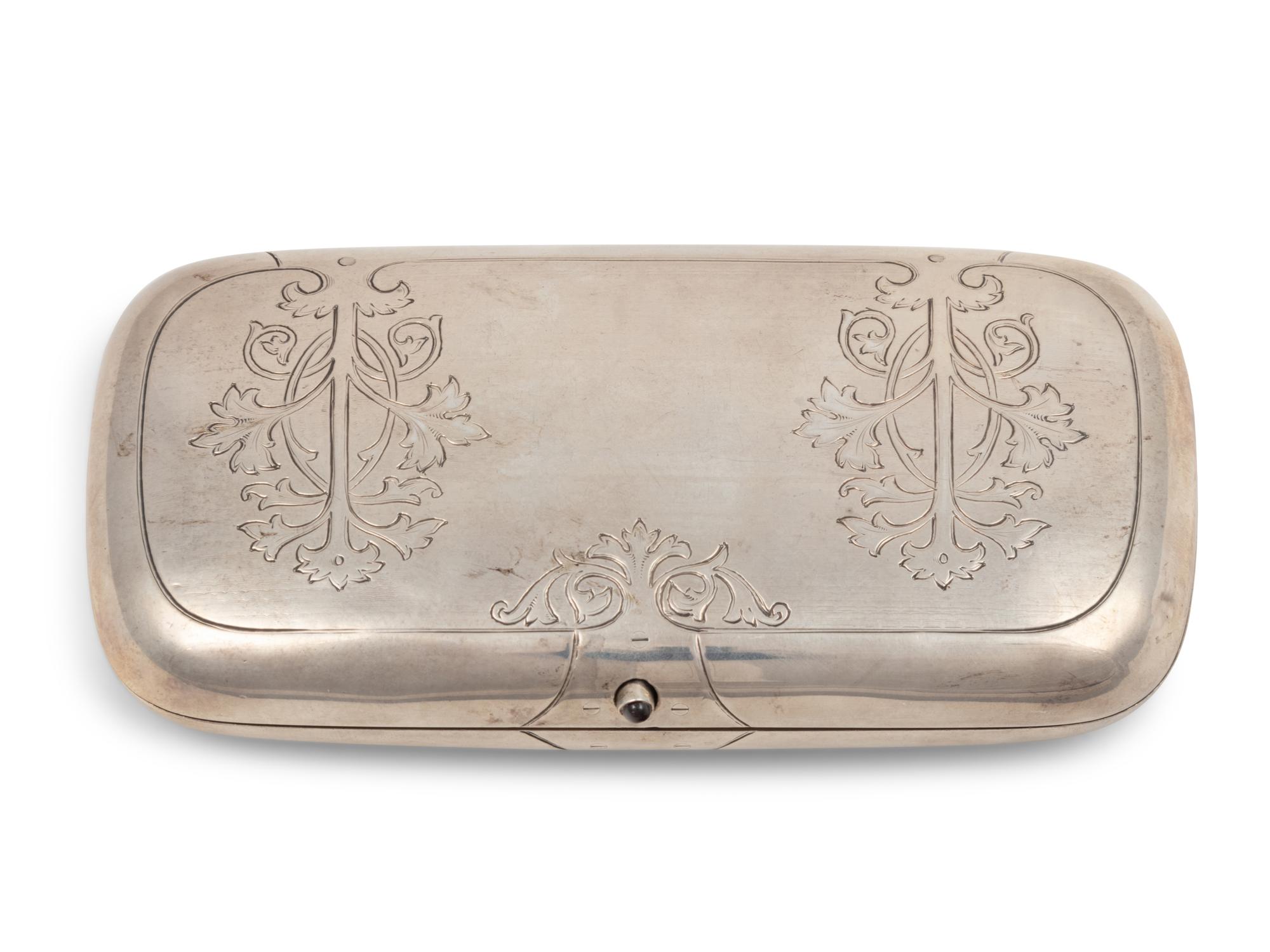 A Russian Silver Emerald and Diamond Inset Cigarette Case