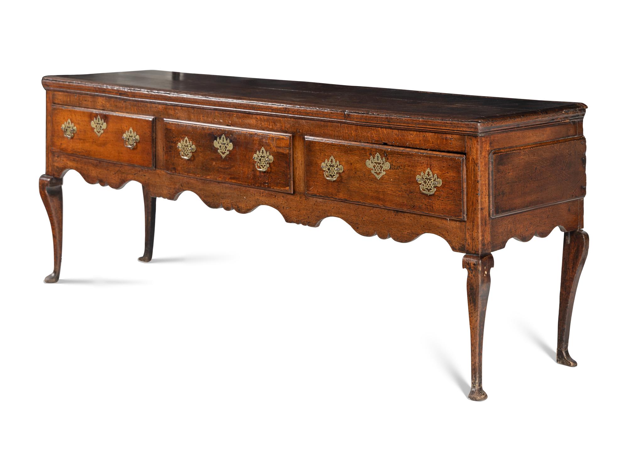 A Provincial Queen Anne Carved Oak Welsh Dresser