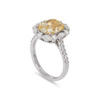 FANCY YELLOW DIAMOND AND DIAMOND RING