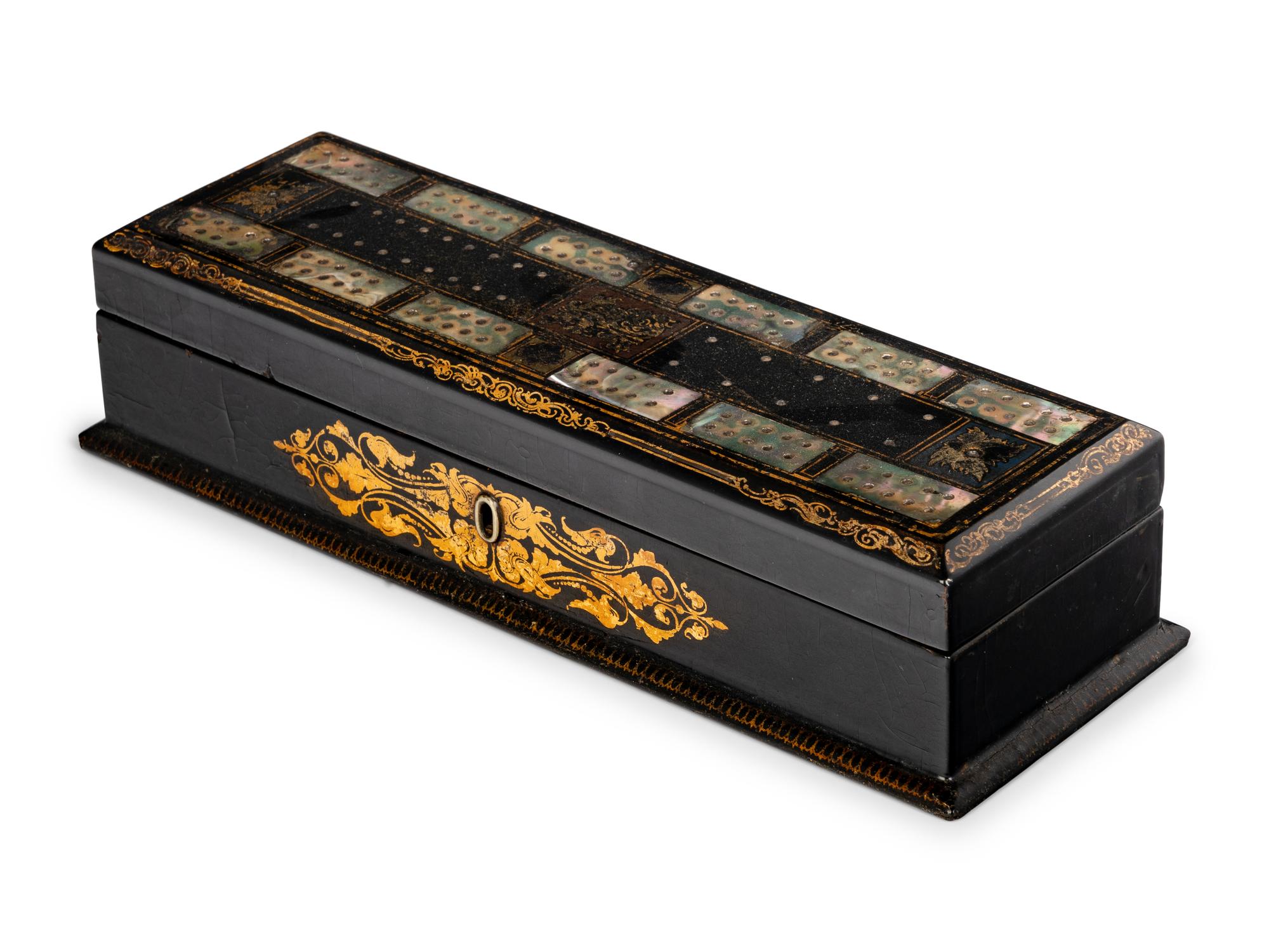 A Victorian Mother of Pearl-Inset and Parcel-Gilt Papier-Mache Cribbage Box