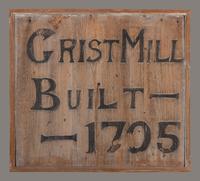 A Carved Wood 'Grist Mill' Trade Sign