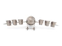 A Silver-Plate Airplane-Form Cocktail Shaker and Shot Glass Set