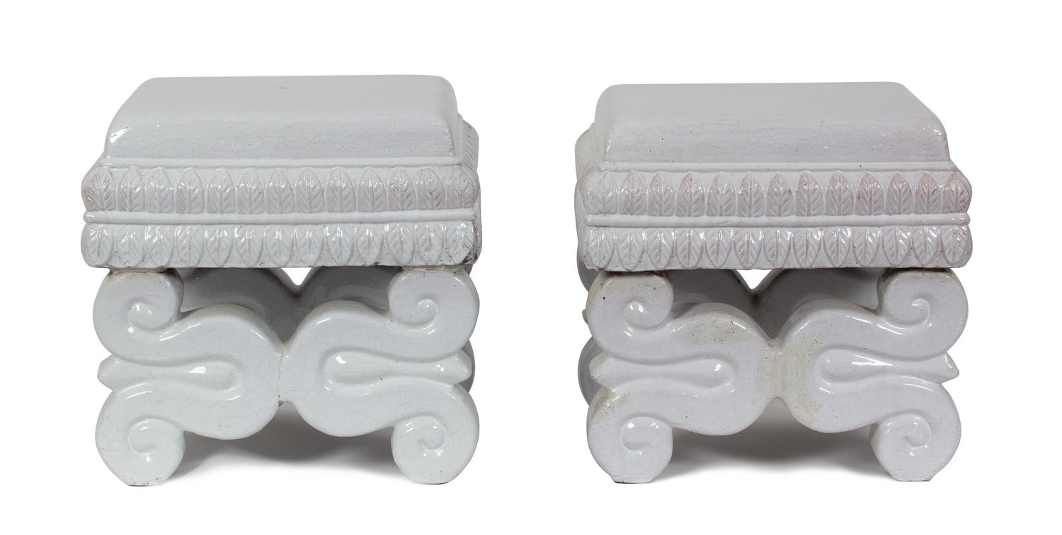 A Pair of Continental White Glazed Ceramic Stools Height 16 1/2 x width 16 1/2 x depth 12 1/2 inches. — 20TH CENTURY