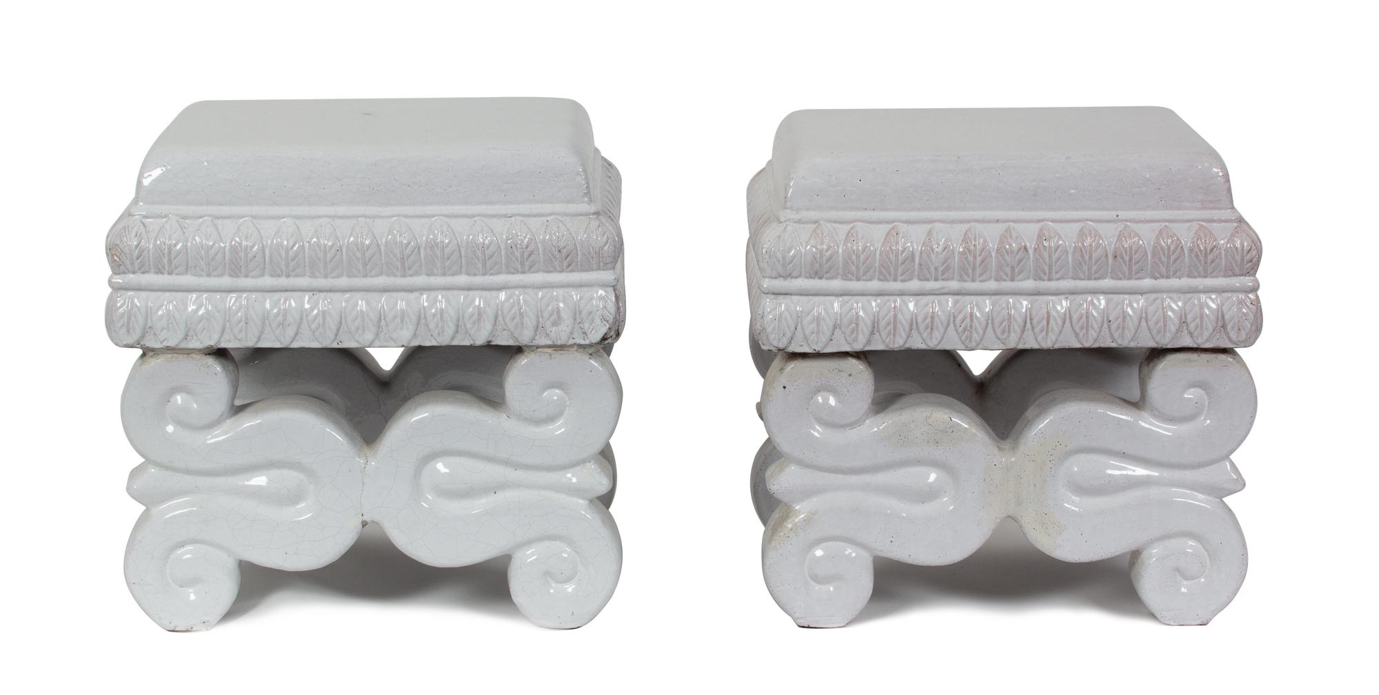 A Pair of Continental White Glazed Ceramic Stools Height 16 1/2 x width 16 1/2 x depth 12 1/2 inches. — 20TH CENTURY