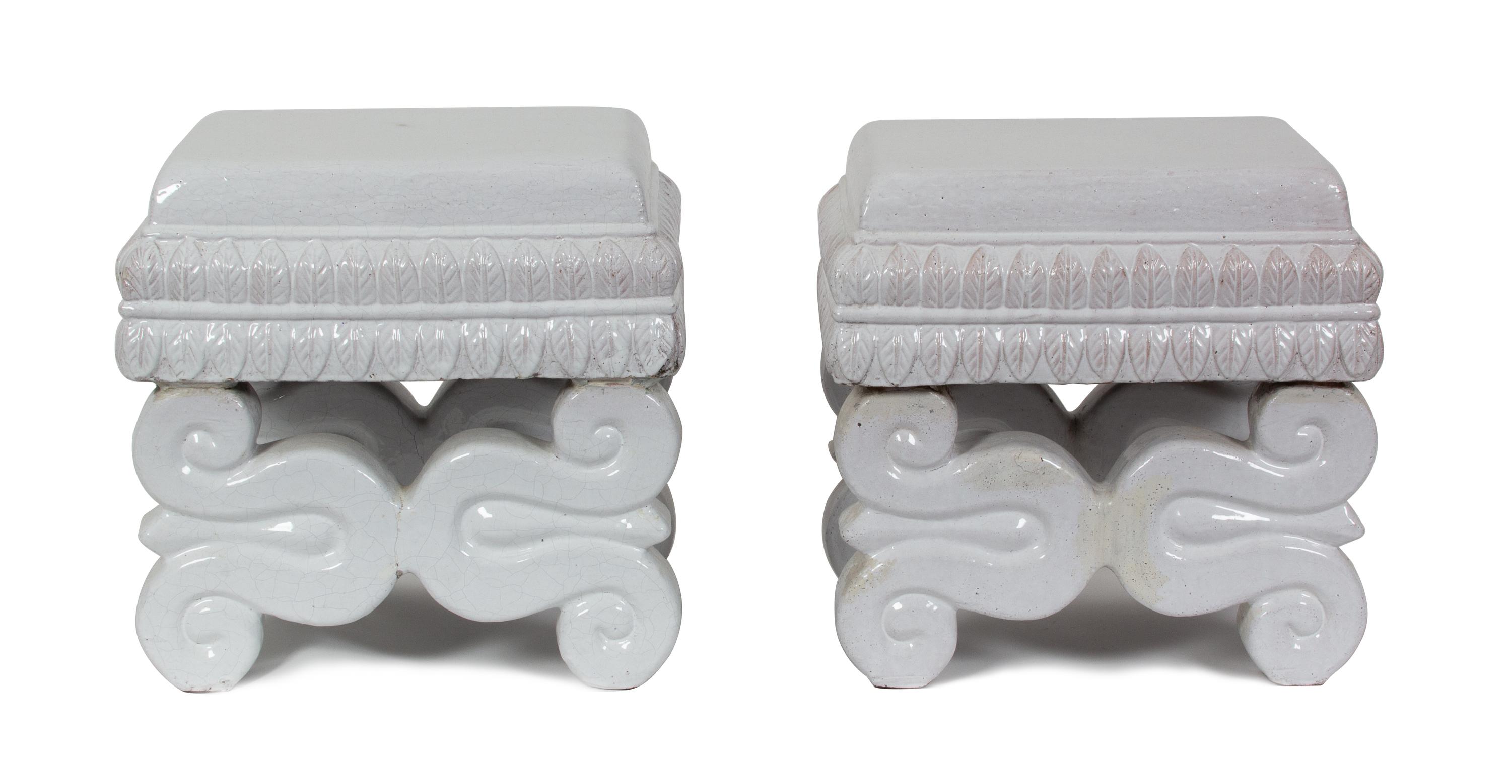 A Pair of Continental White Glazed Ceramic Stools Height 16 1/2 x width 16 1/2 x depth 12 1/2 inches. — 20TH CENTURY