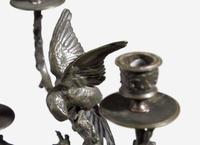 A Pair of Patinated Bronze Animalier Four-Light Candelabra
