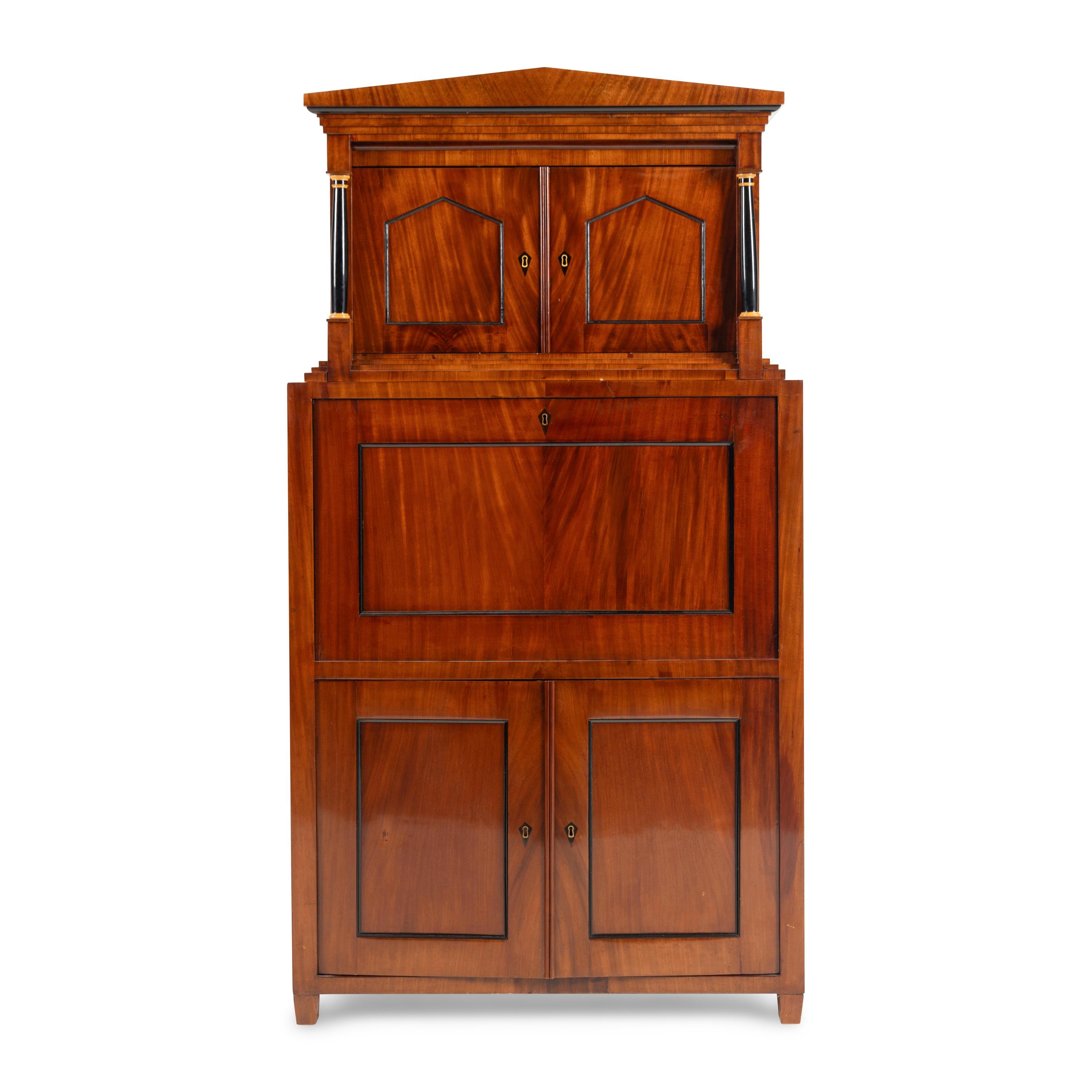 An Austrian Neoclassical Part-Ebonized Mahogany Bureau Cabinet