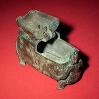 A Chinese Bronze 'Figural' Oil Lamp, Western Han Dynasty — 西漢 青銅神人油燈